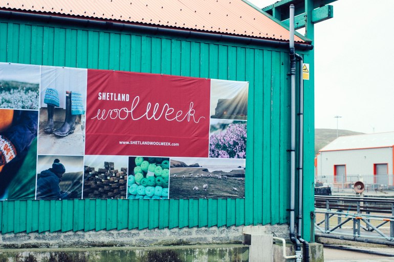 the wool week banner at the museum